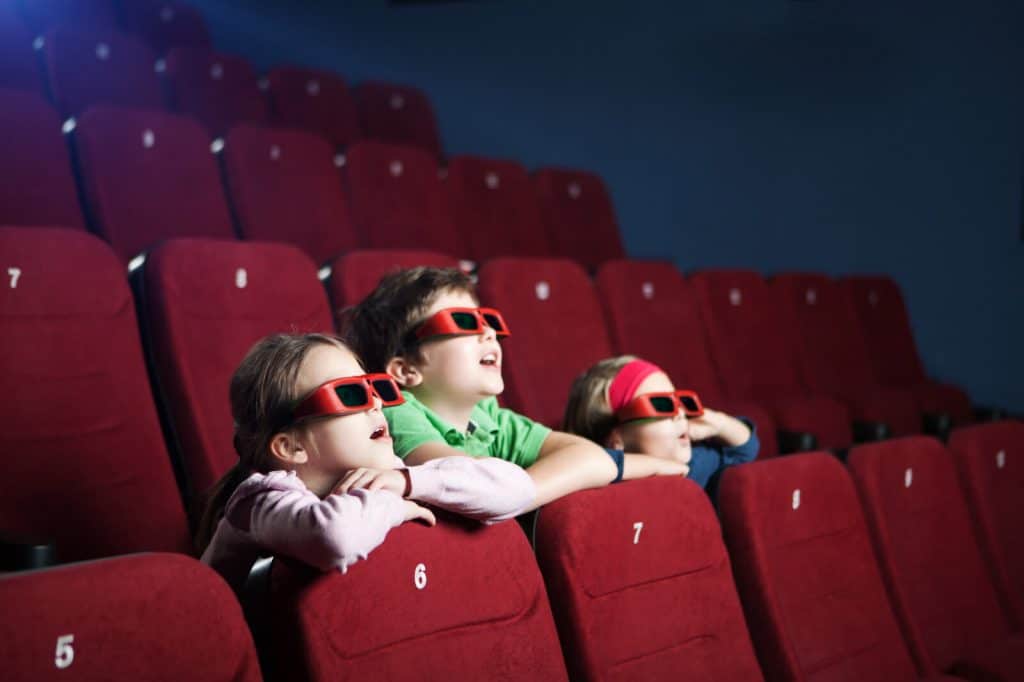 kids watching movie in cinema - movie with kids