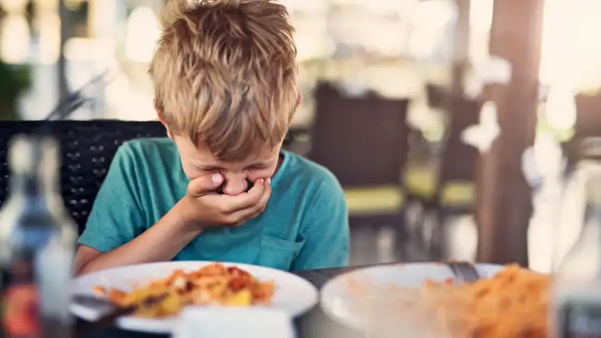 Toddlers Holding Food in Their Mouths